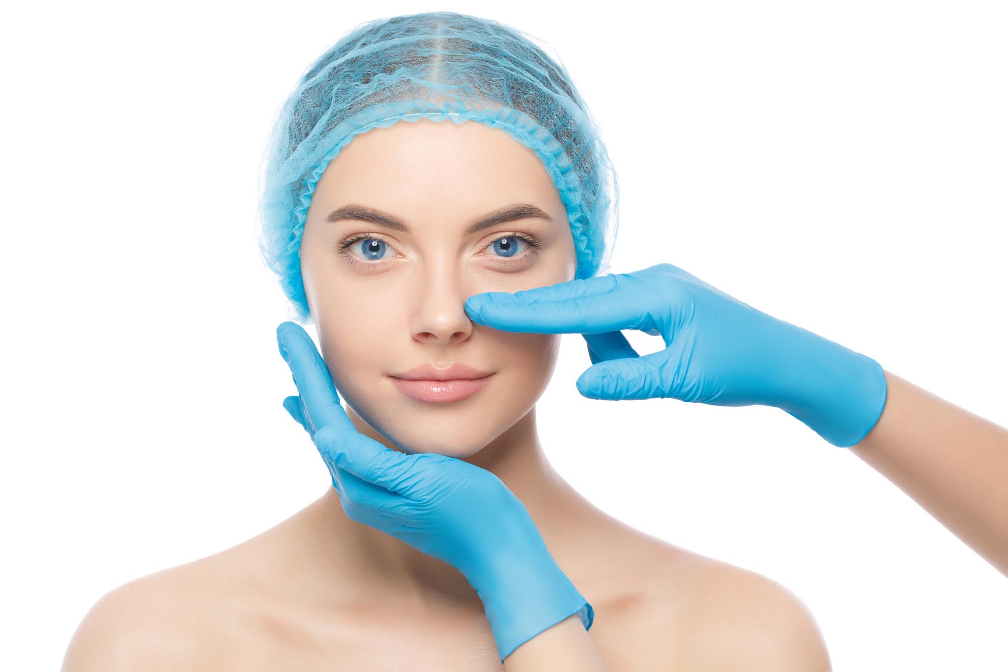 A woman wearing blue gloves and a blue cap, representing Peak ENT, with her face partially covered.
